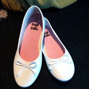 White ballet flats.